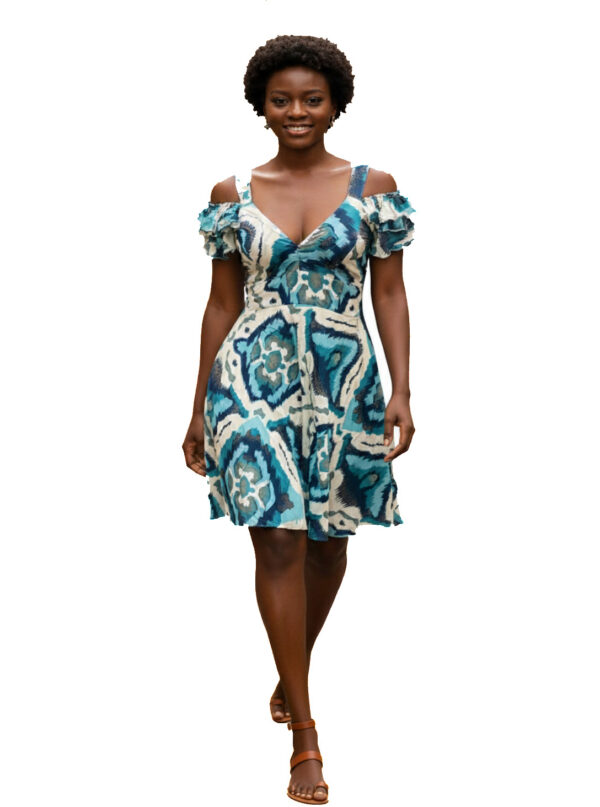 Woman wearing blue and teal Ikat print cold shoulder mini dress with V-neck and ruffles. Tropical A-line summer sundress